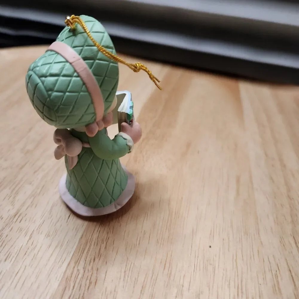 1995 Precious Moments girl singing from song book ornament